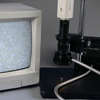 Monitor NOT Included. Camera for live motion video microscopy is included.   